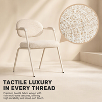 Fauteuil de salle à manger moderne et élégant de style nordique, avec dossier ouvert, revêtement en tissu doux et structure métallique