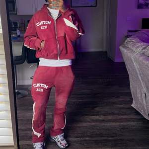 Ensemble survêtement unisexe personnalisé à capuche et jogger Survêtement surdimensionné Fabricant Streetwear Coupe-vent Baggy Survêtements pour hommes
 - Product Image 4