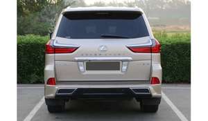 SUV d'occasion 2022 GCC LX 570 AWD Or avec pneus R20, sièges en cuir, régulateur de vitesse automatique adaptatif (ACC), caméra 360°, feux LED - Product Image 2