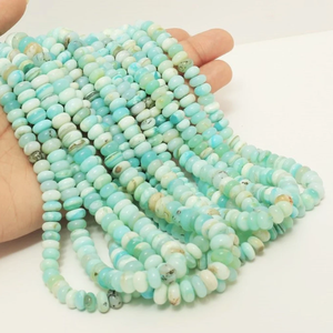 ลูกปัดโอปอลเปรูสีน้ำเงินสวยงาม รูปทรงรอนเดลล์ เรียบเนียน ขนาด 15 นิ้ว 5-8 มม. ลูกปัดอัญมณีโอปอลเปรูสีไล่ระดับ เรียบเนียน สำหรับทำเครื่องประดับ - Product Image 1