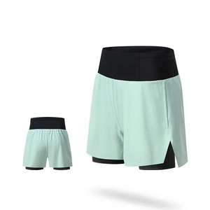 Pantalones cortos para correr maratón para mujer con bolsillo en la cintura trasera Forro incorporado Yoga de secado rápido Fitness Senderismo Entrenamiento Pantalones cortos deportivos - Product Image 1