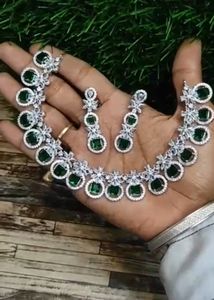 A beautiful emerald regal halo necklace & earrings set made of emerald <b>Green</b> Oval Cut Stones - Product Image 3