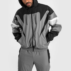 Conjuntos de Jogger de poliéster personalizados para hombre, chándal cortavientos de dos piezas transpirable con chaqueta de nailon con cremallera Patchwork - Product Image 3