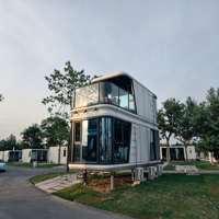 Capsule spatiale préfabriquée double couche personnalisable avec escalier intérieur et verre intimité, idéale pour la construction de stations balnéaires