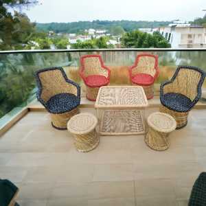 Prix de gros canapé chaises fait à la main en bambou ensemble avec table basse et 2 ensembles de jardin pouf canapés de salon restaurant en plein air - Product Image 6