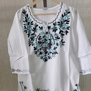 Women's Casual Cotton Reyon Straight <b>Short</b> Kurta with Geometric Embroidery Tank <b>Sleeve</b> for Spring and Autumn Seasons - Product Image 1