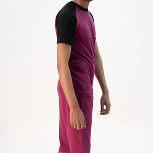 Conjunto de ocio cómodo para hombre con manga raglán en contraste, pantalones cortos de punto de color sólido a juego, ropa para correr, chándales para hombre - Product Image 5