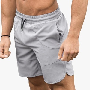 Directo de fábrica Pantalones cortos de gimnasio de verano Fresco y transpirable Bordado personalizado Loose Fit Patrón sólido para hombres - Product Image 4