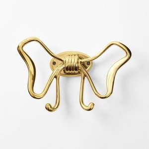 Brass wall hooks stylish option adding metallic charm while maintaining functional purpose throughout interior walls - Product Image 5