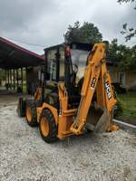 Mini-pelleteuse JCB 1CX à accès étroit 2025 |   Chargeuse sur pneus à largeur réduite |   Chargeuse-pelleteuse pour travaux urbains et aménagement paysager