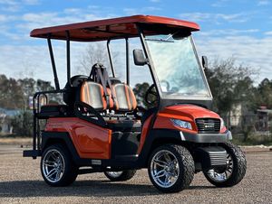 Vendemos el mejor carrito de golf eléctrico Beyond de 4 asientos, color naranja y negro, vehículo utilitario con ruedas cromadas y techo. - Product Image 4
