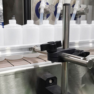 Mesin Pengemas Otomatis untuk Botol Cair 59 ML dan 100 ML, Termasuk Pengisian, Penutupan, dan Pelabelan Botol - Product Image 4