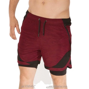 กางเกงขาสั้นวิ่งแห้งเร็วสองชั้นสำหรับผู้ชายชุดออกกำลังกายลายพรางตัวแบบไม่ทอ - Product Image 1