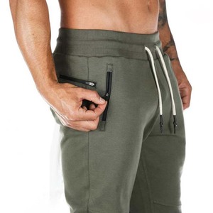 Pantalon respirant pour hommes personnalisé en gros Joggers d'entraînement en polaire de couleur unie avec poches pour les pantalons de jogging pour hommes d'entraînement de gymnastique - Product Image 4