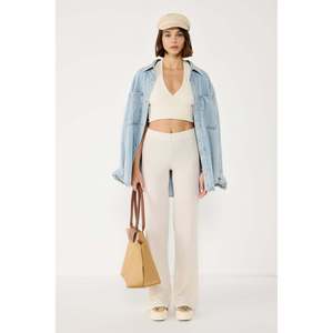 Pantalones Casuales de Cintura Alta con Corte Acampanado, 100% Poliéster - Product Image 1