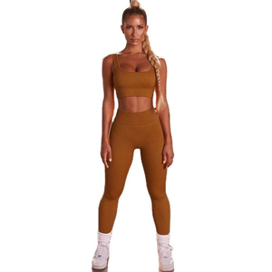 Prix de gros Ensemble de yoga 2 pièces personnalisé de luxe Costume de fitness de haute qualité pour femmes Motif solide Taille élastique grande taille - Product Image 1