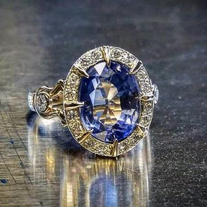 Anello di Fidanzamento Classico con Zircone Blu, Gioiello Elegante da Donna per Feste, con Accenti in Cristallo, Regalo per Uso Quotidiano, in Rame - Product Image 1