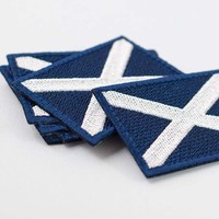L'écusson du drapeau écossais, le drapeau du pays de l'Écosse, l'emblème national de la croix de St Andrew, le fer brodé sur