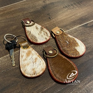 พวงกุญแจหนังวัวมาใหม่พวงกุญแจหนังพิมพ์ลายเสือดาววัวพวงกุญแจหนังมีสไตล์ - Product Image 1