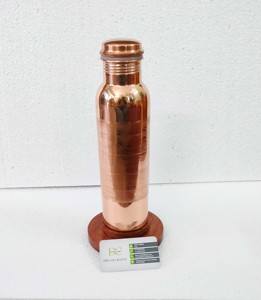 Botella de cobre anticorrosión de lujo de 1L, diseño minimalista, patrón de rayas, tapa a prueba de fugas, bebida directa, 40 oz para regalos - Product Image 1