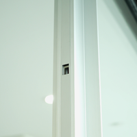 Porte coulissante en verre ALUFRONT Apex 180 à cadre minimal extra large à rupture de pont thermique pour ouvertures de villas de grande envergure