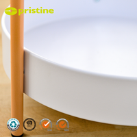 Table basse moderne à 2 niveaux rotative avec structure en métal et étagères en plastique pour le mobilier de salon