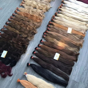 Extensiones de Cabello Vietnamita Remy 100% con Puntas Planas de Queratina, Color Claro, Pre-Adheridas con Cinta, Estilo Liso y Ondulado - Product Image 1