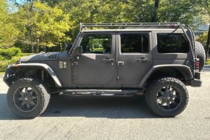 JEEP WRANGLER UNLIMITED SP0RT 4X4 2015 D'OCCASION CÔTÉ GAUCHE/CÔTÉ DROIT - Product Image 3