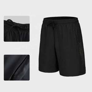 กางเกงขาสั้นออกกำลังกายผู้ชาย 7 นิ้ว แบบสปอร์ต สำหรับวิ่งและฝึกซ้อม แห้งเร็ว มีซิป ขายส่ง ลายเรียบ - Product Image 3