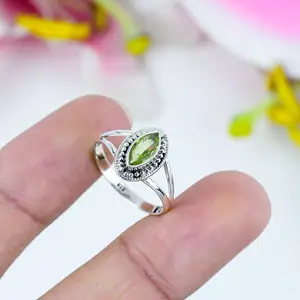 最新天然橄榄石侯爵夫人宝石设计师凸圆形精品珠宝925纯银女性结婚礼物纸牌戒指