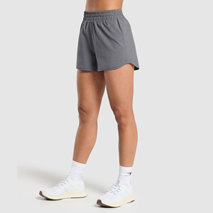 Gran oferta de pantalones cortos de Yoga informales para correr para mujer, cintura alta, ajuste holgado, patrón sólido transpirable, hecho de Spandex/nailon falso de dos piezas - Product Image 1