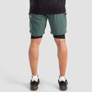 Pantalones Cortos Deportivos Aero 100% Poliéster Verdes, Tallas XS-XL, Cintura Media, Tejido Impermeable con Decoración de Tela de Rizo de Color y Patrón de Logotipos - Product Image 3