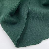 Tissu piqué vert 190GSM tricoté ignifuge teint uni pour polos et vêtements de travail FR pour t-shirts et vêtements d'utilisation