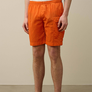 กางเกงขาสั้นคาร์โก้โพลีเอสเตอร์สำหรับผู้ชายกางเกงไฮสตรีทแข็งแรงเป็นมิตรกับสิ่งแวดล้อมสีส้มสดใสมีกระเป๋าด้านข้างเอวยางยืดสำหรับชุดลำลองฤดูร้อน - Product Image 2