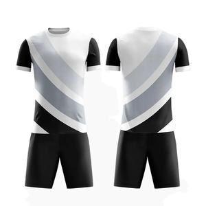 Conjuntos de uniformes de fútbol sublimados de poliéster 100%, camiseta de fútbol con estampado de colores personalizados, pantalones cortos negros lisos fabricados por RAM Industry - Product Image 1