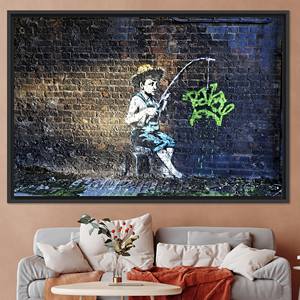 Impresión en Lienzo de Banksy, Niño Pescador: Obra de Arte Urbana, Lienzo con Marco Negro - Product Image 1