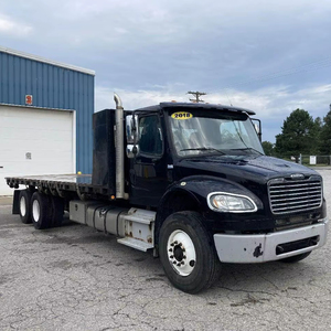 Camion benne à plateau plat d'occasion M2 106 à double essieu de 26 pieds avec boîte de vitesses automatique de 300 CV, fiable pour le transport commercial et la construction - Product Image 1
