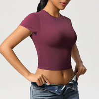 Haut de Pilates décontracté à séchage rapide en nylon double face T-shirt de sport à manches courtes pour la course à pied et le fitness.