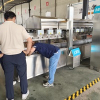 Machine à frire entièrement automatique pour nuggets de poulet et galettes de viande avec fonction de filtration d'huile pour usine de transformation de produits carnés