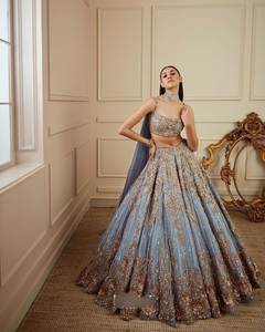 Lehenga choli ตาข่ายเนื้อนุ่มออกแบบอย่างพรีเมี่ยมพร้อมงานปักลำดับและจับคู่ dupatta สำหรับเจ้าสาวและงานรื่นเริง - Product Image 1