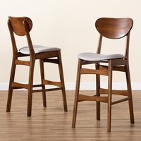Tabouret de bar tendance et contemporain avec structure en fer, coussin imperméable et design élégant pour l'extérieur et la cuisine