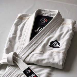 BJJ GI ชุดยูนิฟอร์มยูโดทำจากผ้าฝ้ายคุณภาพสูงสำหรับทั้งชายและหญิงชุดออกกำลังกายโลโก้ตามสั่งชุดศิลปะการต่อสู้มีบริการ OEM - Product Image 1