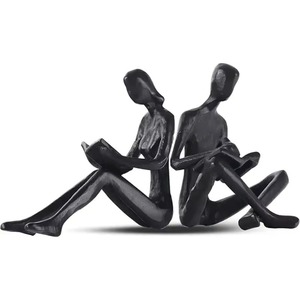 Figuras de pareja de metal que encarnan la profundidad emocional y transforman espacios vacíos en entornos con significado emocional. - Product Image 1
