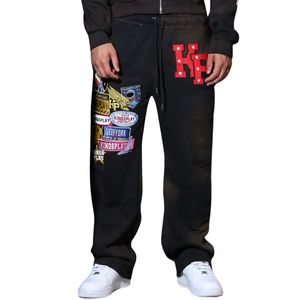 กางเกงวอร์มผู้ชายลายกราฟิก ทรงหลวม ผ้าฟลีซ สไตล์สตรีทแวร์ ดีไซน์โดดเด่น ใส่สบายๆ สำหรับพักผ่อนหรือใส่ทุกวัน - Product Image 6