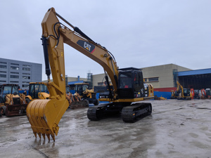 Excavatrice CAT d'occasion, équipement de construction lourd, sur chenilles jaunes - Product Image 6