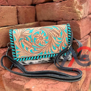 กระเป๋าสตางค์หนังแท้สไตล์ตะวันตกมาใหม่กระเป๋าคลัทช์ขนสัตว์แกะสลักมือมือใช้ได้หลากหลายสำหรับผู้หญิงทันสมัย - Product Image 1