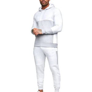 Conjunto Deportivo para Hombre con Bloques de Color Blanco y Gris, Chaqueta con Cierre, Atuendo Deportivo Informal para Gimnasio o Viajes - Product Image 1
