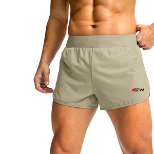 Ensemble de deux shorts d'entraînement en polyester à séchage rapide avec taille élastique et poches pour hommes, idéal pour la course à pied et les sports d'équipe. - Product Image 1