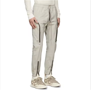 Pantalon cargo décontracté personnalisé en nylon Pantalon de parachute de jogging à sueur empilée Pantalon de parachute pour hommes Pantalon de survêtement baggy en nylon évasé à jambe large droite - Product Image 1