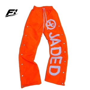 Pantalones de hombre de nailon personalizados con botones a presión, estilo urbano, casuales, con bordado desgastado, cortavientos, tallas grandes, pantalones deportivos, proveedor de EE. UU. - Product Image 1